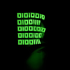 Image of the black FH0 – Knøwn H0st’s Binary Hoodie by Slash-32 showing the custom binary signature glowing in the dark on the hood.