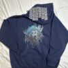 Image of FH0 – Kn0wn H0st’s Binary Hoodie by Slash-32 in Navy Blue, featuring /32 microchip graphic on back and custom binary signature on the hood.