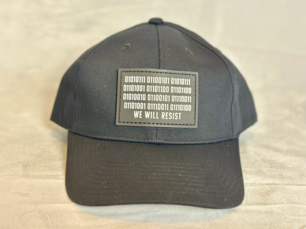 Image of Slash-32 Ladies Snug Black "We Will Resist" Snapback Cap, front view displaying binary code and “We Will Resist” text.
