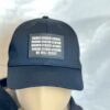 Image of mannequin wearing Slash-32 Ladies Snug Black "We Will Resist" Snapback Cap, showing binary code and “We Will Resist” on the front panel, with the microchip /32 patch on the side.