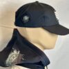 Image of Slash-32 Ladies Snug Black "We Will Resist" Snapback Cap on mannequin, featuring binary code and “We Will Resist” text on the front panel, with the /32 microchip patch sewn on the side.
