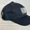 Image of Slash-32 Ladies Snug Black "We Will Resist" Snapback Cap, side view showing the /32 microchip patch and binary design with “We Will Resist” text across the front.
