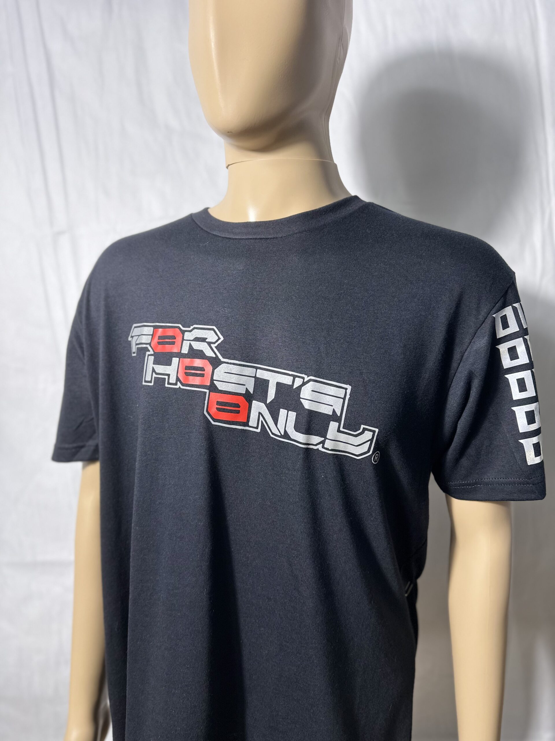 Image of FH0 – Kn0wn H0st’s Binary Tee by Slash-32 in Navy, front view on mannequin with “For Hosts Only” text on chest and custom binary matrix on left sleeve