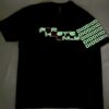 Image of FH0 – Kn0wn H0st’s Binary Tee by Slash-32 in Black showing glow-in-the-dark binary matrix on left sleeve.