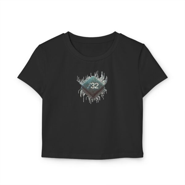 Front view of the black ‘We The People’ Ladies Baby Tee from Slash-32’s Preamble Collection, featuring a microchip symbol graphic representing digital unity.