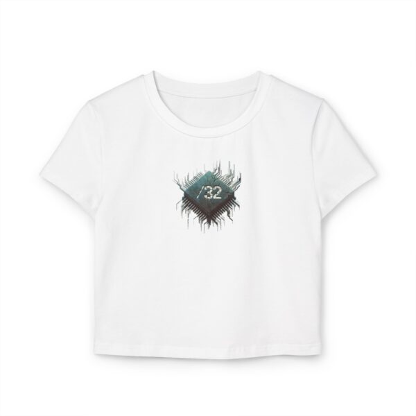 Front view of female model wearing the white ‘We The People’ ladies baby tee from Slash-32’s Preamble Collection, featuring a microchip symbol graphic representing digital unity.