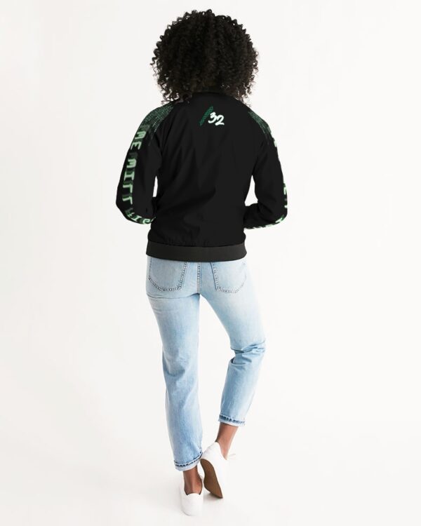 Back view of female model wearing Slash-32’s women’s ‘We Will Fight’ Black Label Jacket, a durable and comfortable bomber inspired by Infrawear, designed for streetwear and cybersecurity enthusiasts.