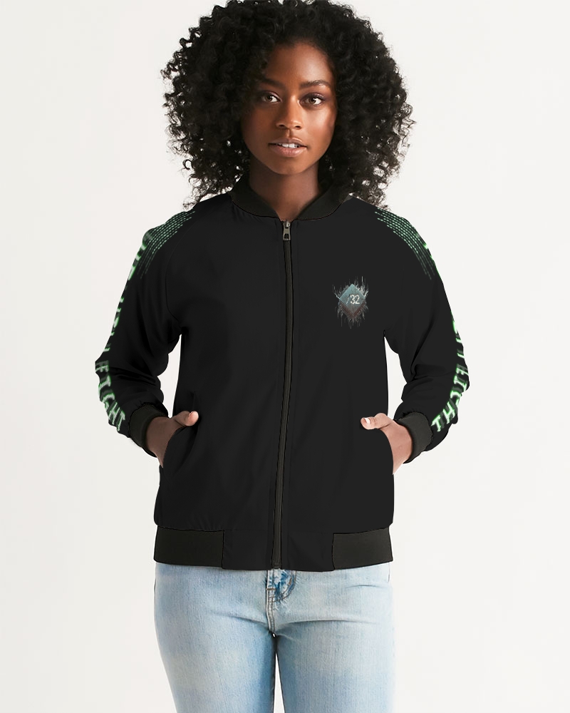Front view of female model wearing Slash-32’s women’s ‘We Will Fight’ Black Label Jacket, a durable and comfortable bomber inspired by Infrawear, designed for streetwear and cybersecurity enthusiasts.
