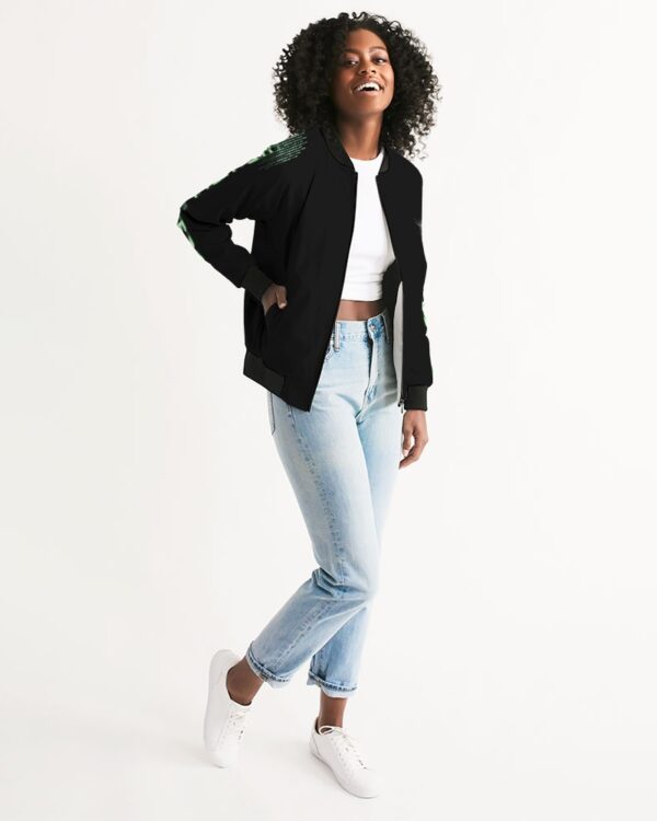 Side view of female model wearing Slash-32’s women’s ‘We Will Fight’ Black Label Jacket, a durable and comfortable bomber inspired by Infrawear, designed for streetwear and cybersecurity enthusiasts.