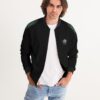 Front view of male model wearing the men’s ‘We Will Fight’ Black Label jacket from Slash-32’s Preamble Collection, hands in pockets. A streetwear piece symbolizing defiance and digital freedom.