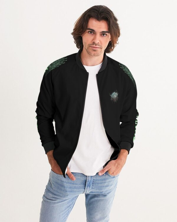 Front view of male model wearing the men’s ‘We Will Fight’ Black Label jacket from Slash-32’s Preamble Collection, hands in pockets. A streetwear piece symbolizing defiance and digital freedom.