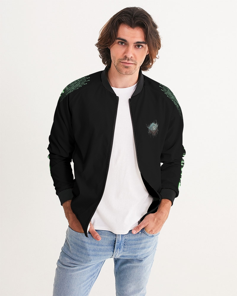 Front view of male model wearing the men’s ‘We Will Fight’ Black Label jacket from Slash-32’s Preamble Collection, hands in pockets. A streetwear piece symbolizing defiance and digital freedom.