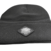 Image of the black “We Will Resist” rolled beanie by Slash-32 with a diamond-shaped patch featuring the /32 microchip symbol sewn in.