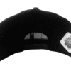 Direct back view of the Slash-32 9/50 Snapback hat, Black (Panda Mode) "We Will Resist" cap, highlighting the white diamond-shaped /32 microchip patch stitched in.