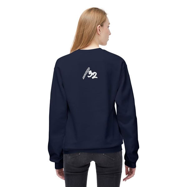 Back view of a female model wearing the navy fleece crewneck sweatshirt, featuring the “/32” mark centered at the upper back. Unisex techwear design.