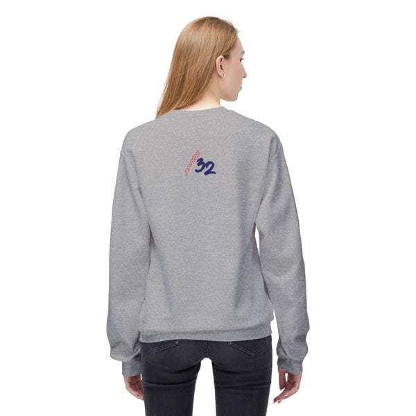 Back view of a female model wearing the sports grey fleece crewneck sweatshirt, featuring the “/32” mark centered at the upper back. Unisex techwear design.