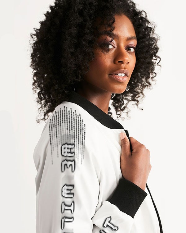 Up-close side view of a female model wearing the Women’s 'We Will Fight' Bomber Jacket, showing the 'We Will Fight' text printed down the right arm.
